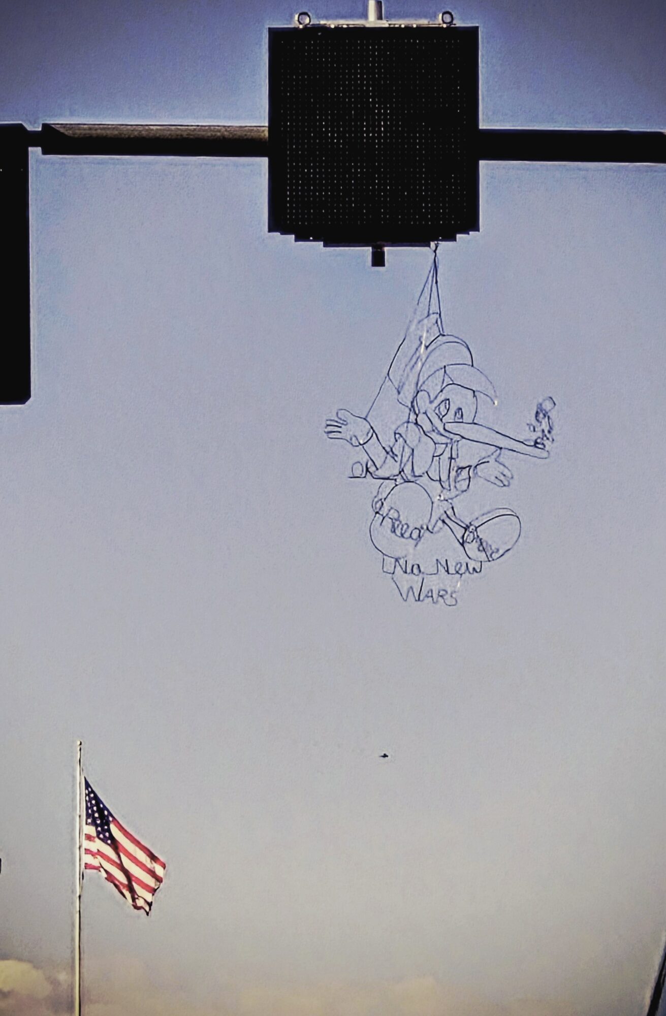 Sketch of a person hanging from a balloon with an American flag below, sky background.
