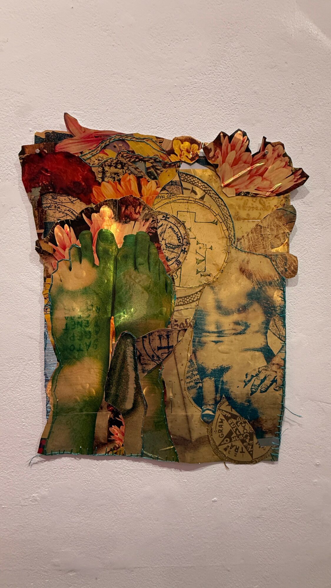 Collage of torn paper with images of flowers, a clock, and a face, layered with various colors and textures.