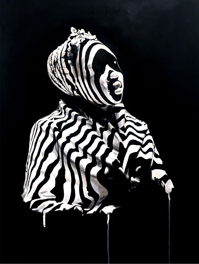 Black and white striped sculpture of a person with a head covering, set against a dark background.