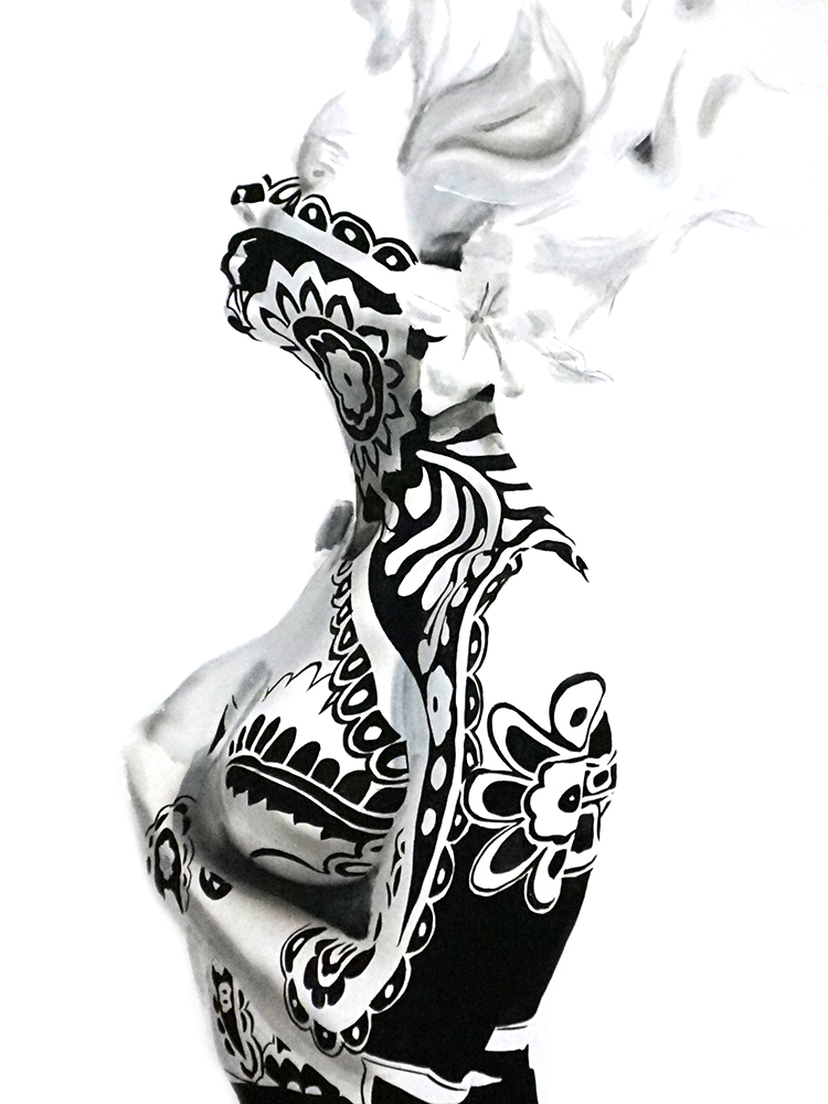 Person with intricate black and white body paint, standing sideways, with detailed patterns covering their body and face.