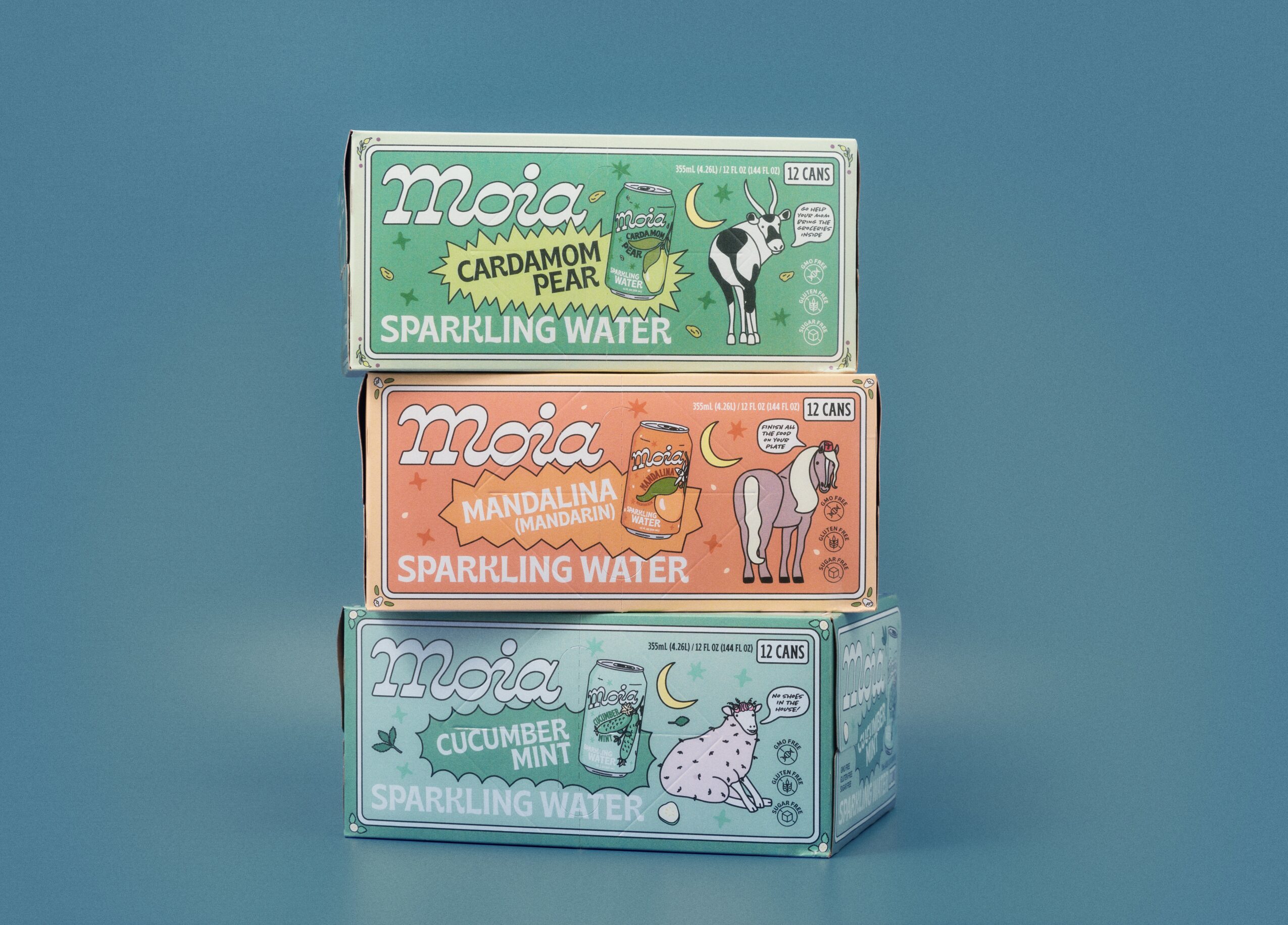 Three boxes of sparkling water stacked vertically against a blue background, each with colorful labels and illustrations.
