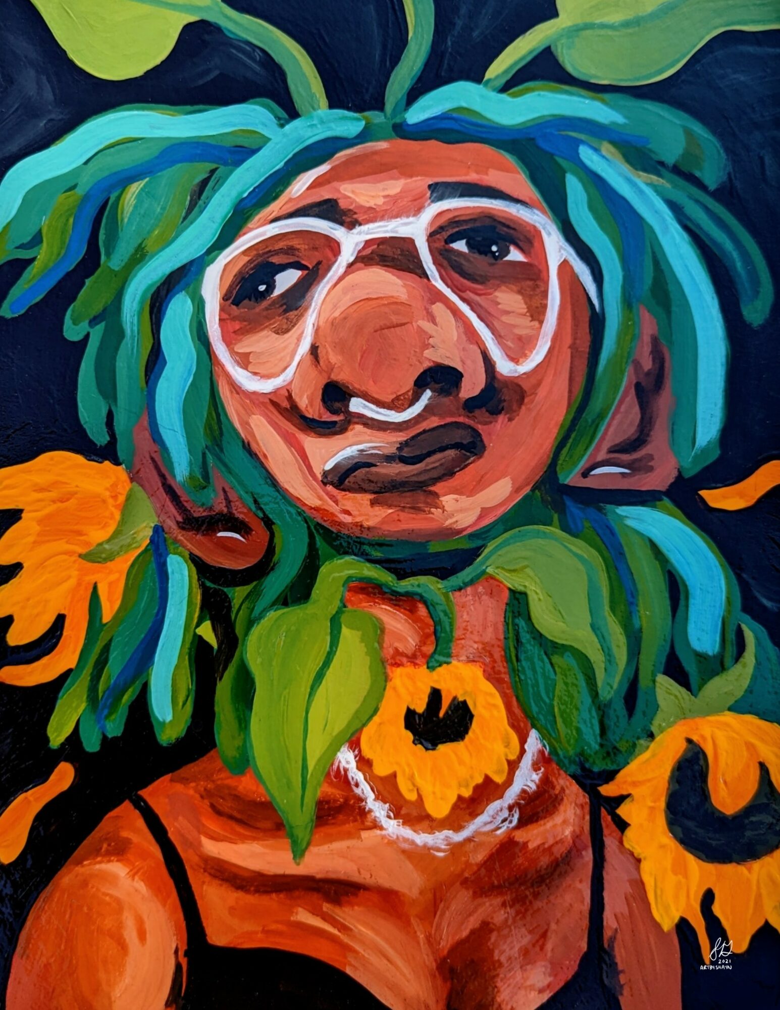 Portrait of a person with colorful hair, glasses, and a necklace with a sunflower pendant, surrounded by vibrant leaves and flowers.