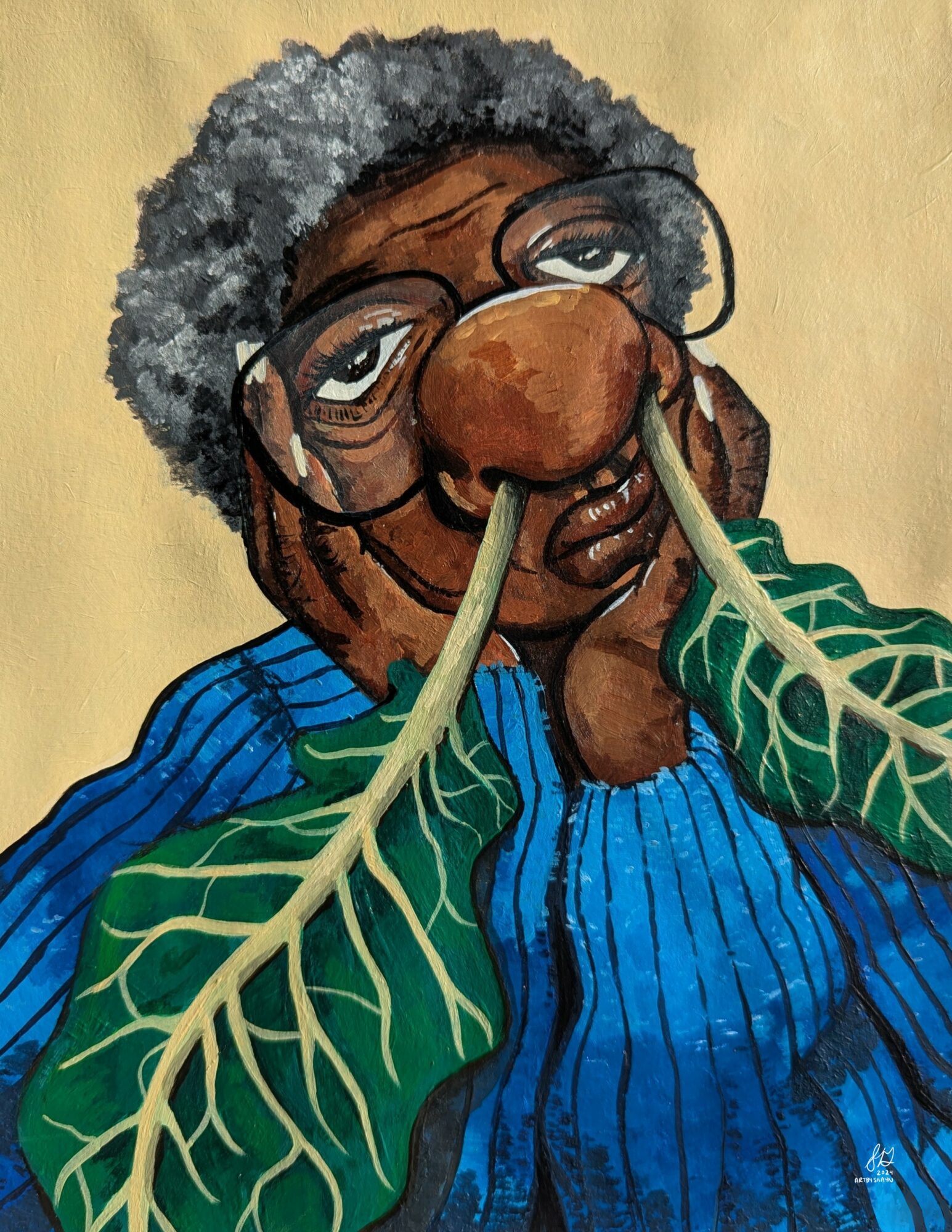 Person with gray curly hair, glasses, and a large nose, holding green leaves with prominent veins near face, wearing a blue shirt.