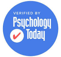 Blue circular badge with white text and a red checkmark, stating verified by Psychology Today.