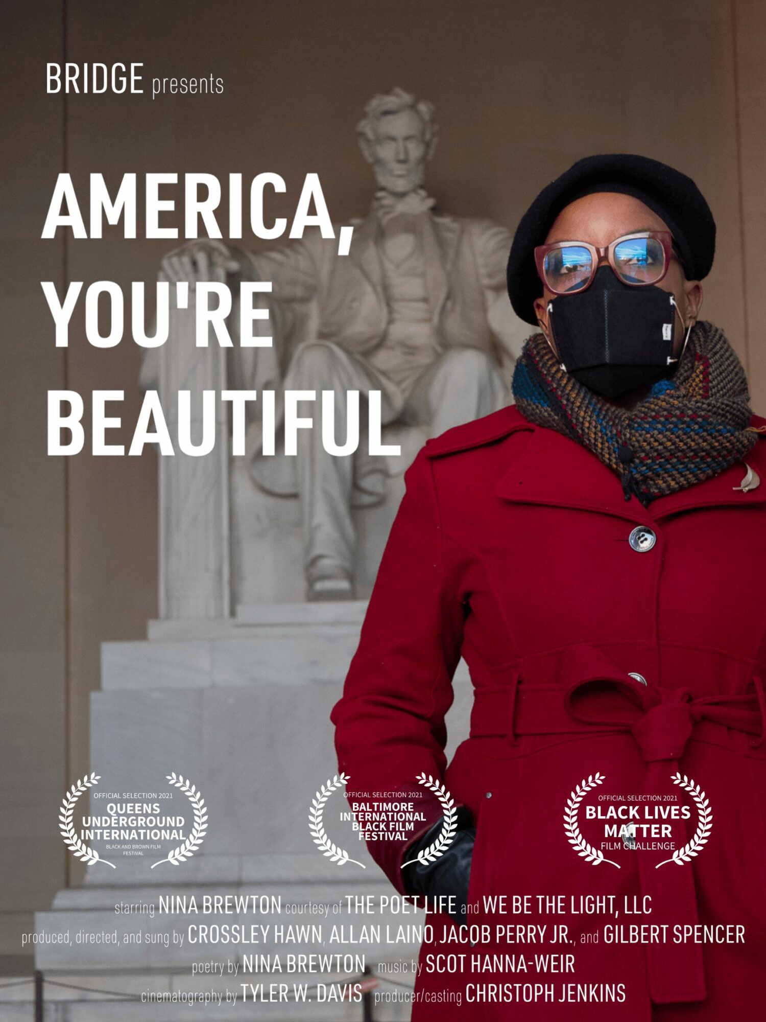 Person wearing a red coat, black hat, glasses, and face mask standing in front of a statue, with text about America and beauty.