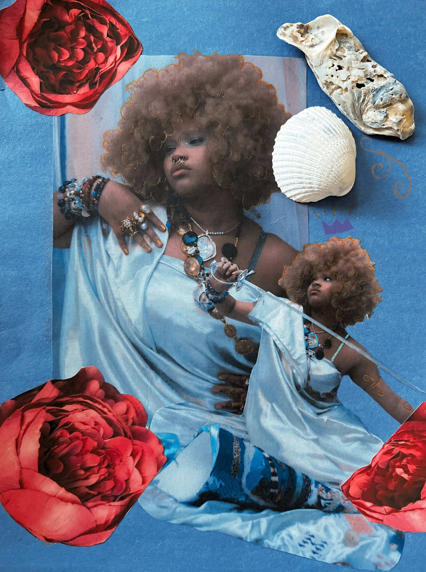 Child with curly hair wearing jewelry and a flowing dress, surrounded by seashells and red roses, lying on a blue surface.