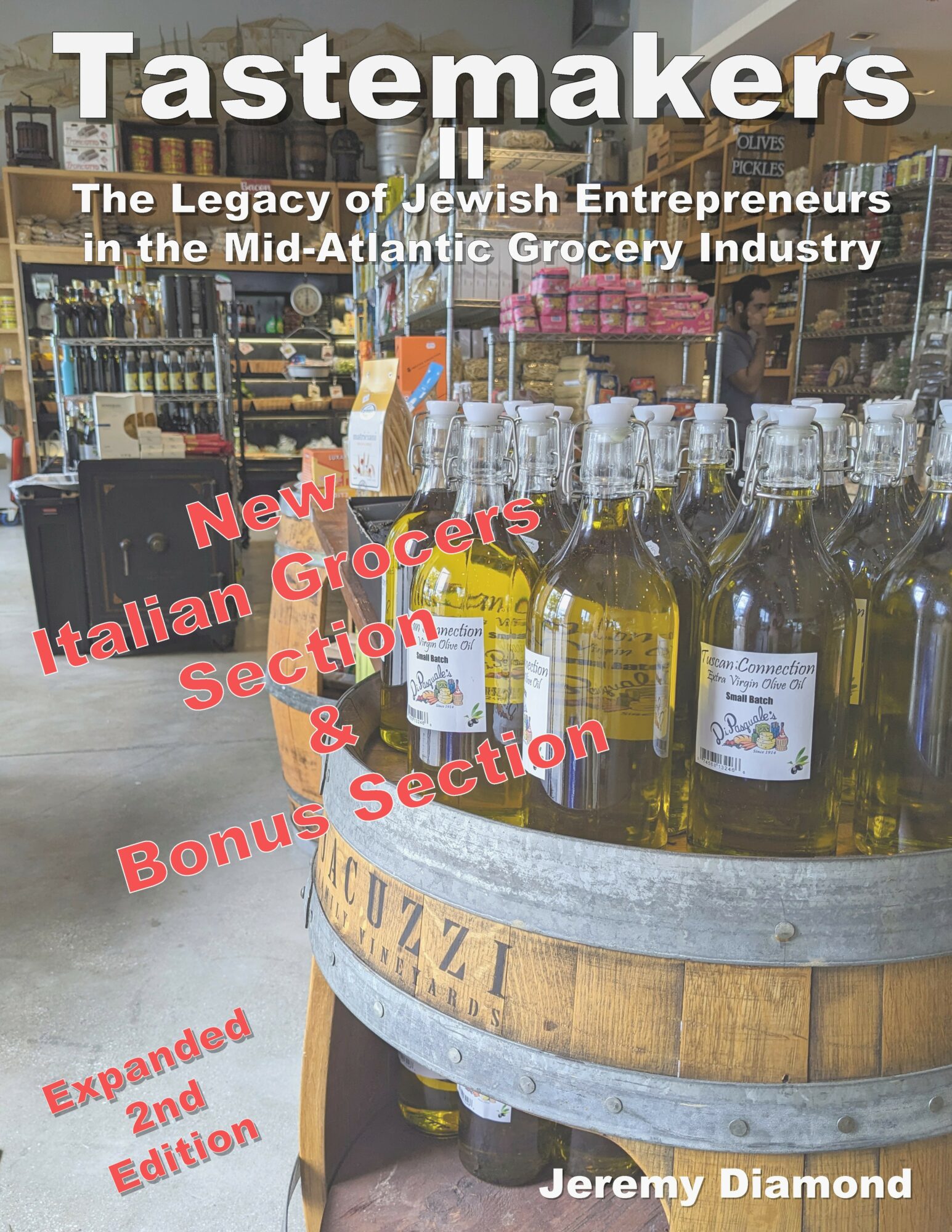Book cover titled 'Tastemakers' with bottles of olive oil on a display table in a grocery store, shelves in background.