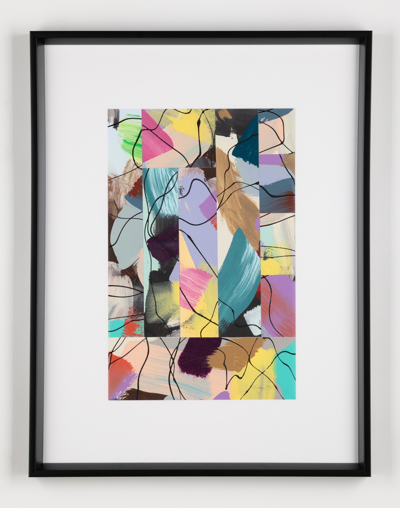 Abstract colorful artwork with various shapes and lines, framed and hung on a wall.