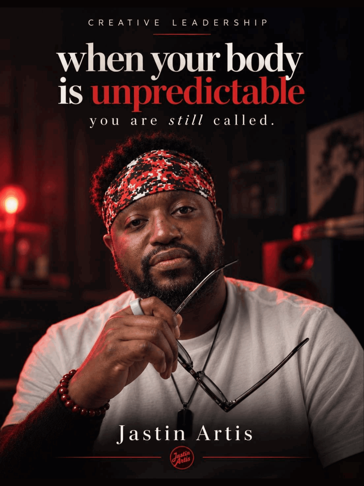 Man with a headband holding glasses, dark background, text about body and unpredictability, author Jastin Artis.